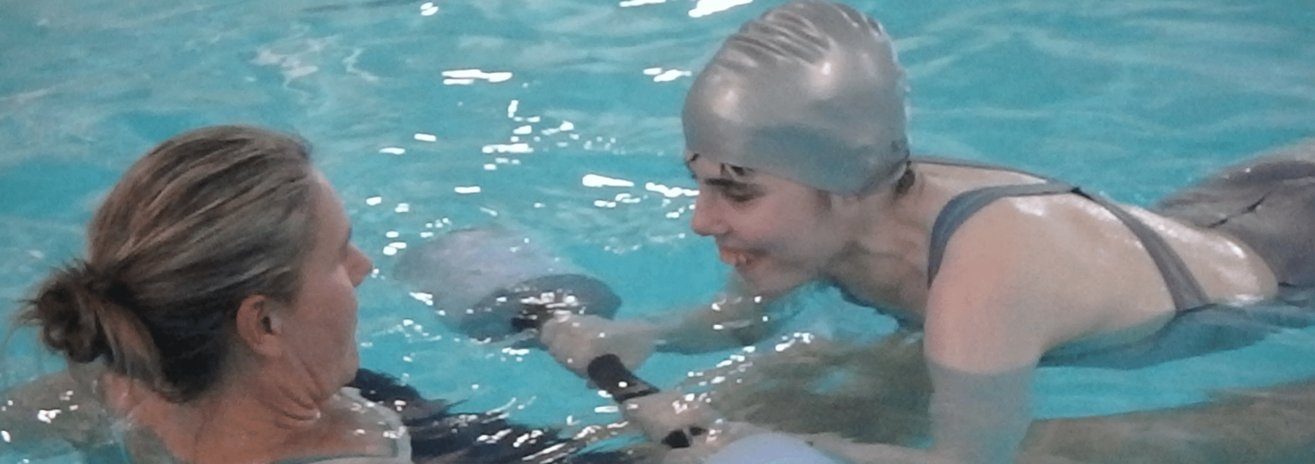 Aquatic Therapy Instructor with Swimmer