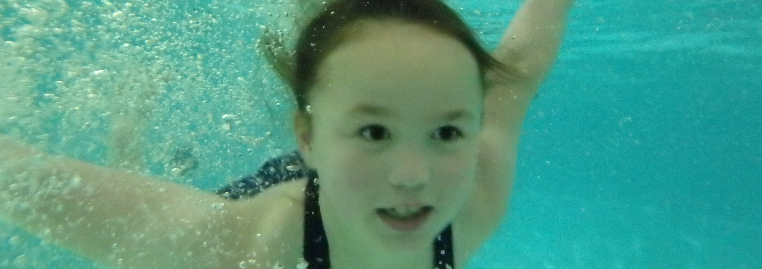 Girl Swimming Under Water